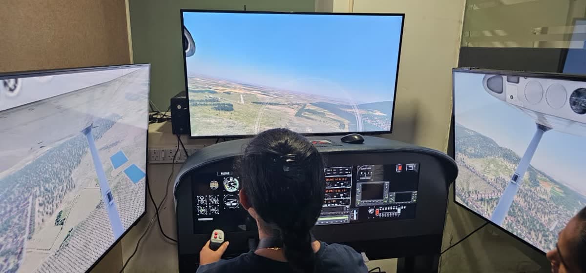 A TATS cadet training on the flight simulator